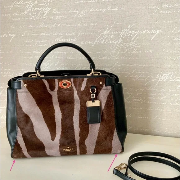 Coach,calf hair and leather top handle
Bag - Picture 14 of 14